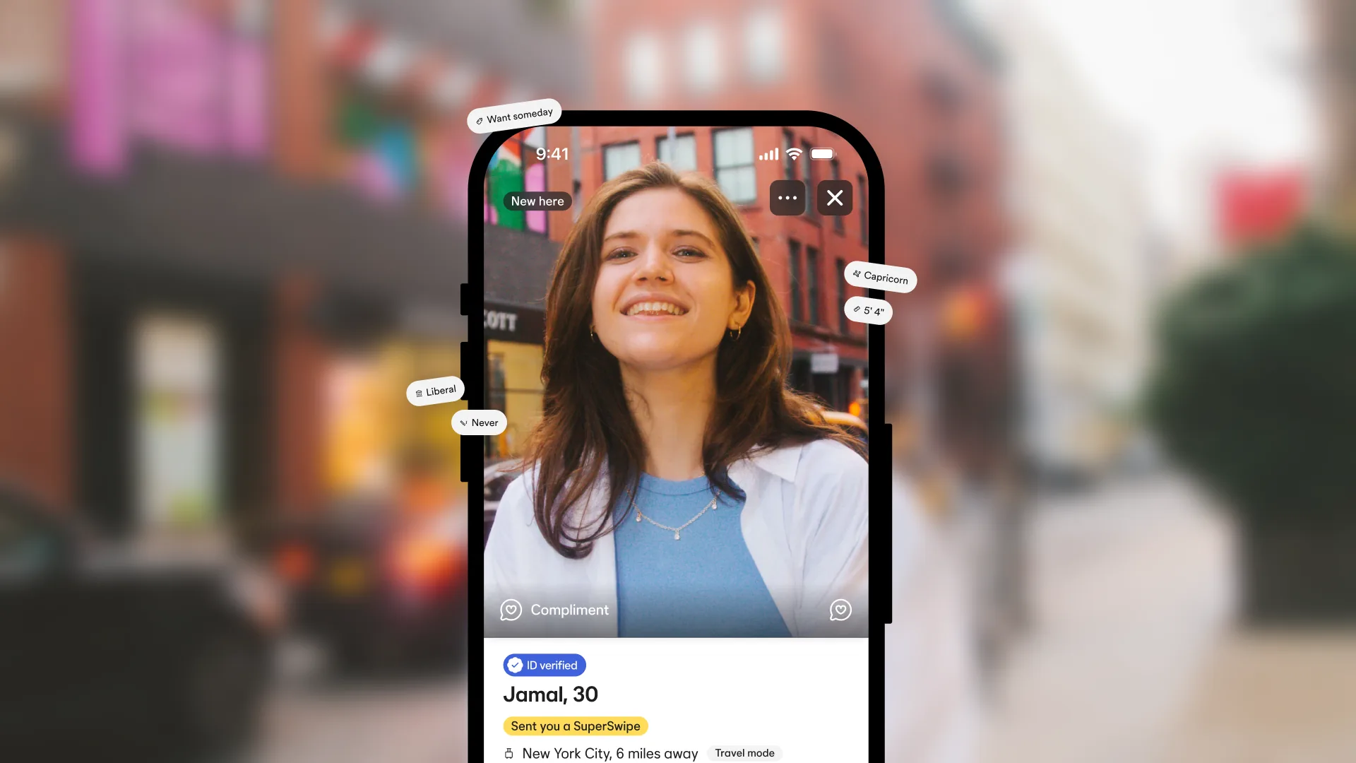 Bumble profile card on a phone over a blurred city street